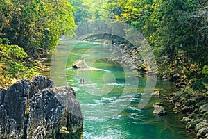 People fishing in Cahabon river next to Semuc champey natural park