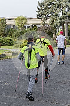 WROCLAW, POLAND - OCTOBER 15, 2017: People in fitness course nordic walking competition in the city park