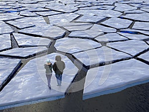 People floating on ice floe