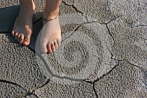 People foot and desert ground