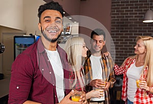 People Friends Drinking Orange Juice Talking Laughing Sitting At Bar Counter, Mix Race Man Happy Smiling