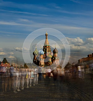 people in front of St basil cathedral in the red square, moscow, russia