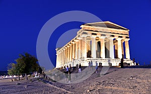 25.08.2018.People in front of The Temple of Concordia is a Greek temple of the ancient city of Akragas, located in the Valley of t