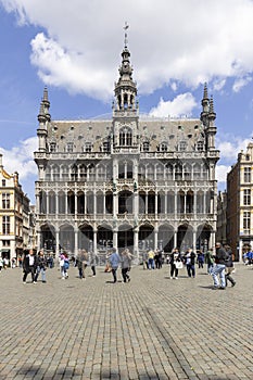 People in front of tenement house called Maison du Roi (King's House) in Grand Place, Brussels, Belgium