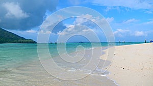 People Fun, Swimming and Sunbathing at Shore Coast near Sea on Tropical Island