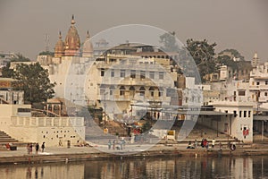 People gather to bathe at the Ghats photo