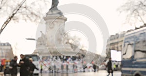 People gather to place candles at Place de la Republique, Paris