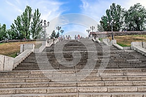 People go down the stairs on Flotsky Boulevard in Mykolaiv, Ukraine