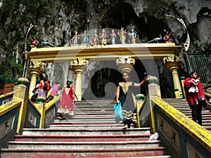 People going down and up the stairs of the Batu Caves. Malaysia