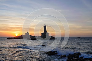 People greet the sunrise in Kanyakumari photo