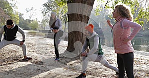 People Group Doing Stretching Exercises Young Active Fitness Outdoor Near Tree Sport Man And Woman Morning