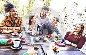 People group drinking cappuccino at coffee bar restaurant - Friends talking and having fun together at outdoors cafeteria