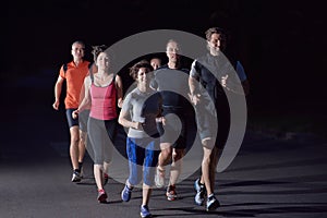 People group jogging at night