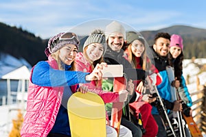 People Group With Snowboard And Ski Resort Snow Winter Mountain Cheerful Taking Selfie Photo