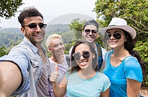 People Group Take Selfie Photo Over Beautiful Mountain Landscape, Trekking In Forest, Mix Race Young Men And Women Happy