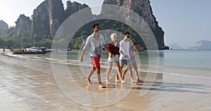 People Group Walking On Beach Talking Two Couples Holding Hands Happy Cheerful Men And Women Tourists On Vacation