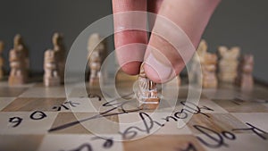 People hand move pawn at camera unusual chess close up in form of lion 4K.