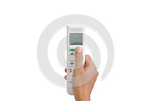 People hand push button of air conditioner remote control isolated on white background. Image with clipping path