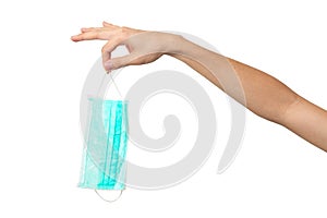 People hand throwing medical face mask isolated on white background