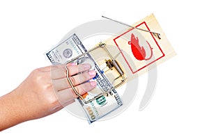 Hand and mousetrap with money