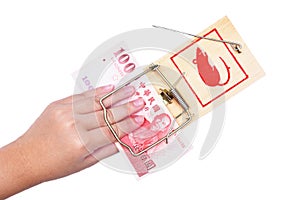 Hand and mousetrap with money