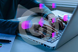 people hand working on laptop computer with digital flowchart database diagram