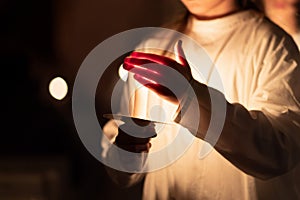 People handling candles in the hands. Christmas and lucia holidays