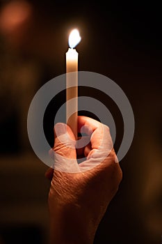 People handling candles in the hands. Christmas and lucia holidays in Sweden