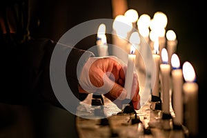 People handling candles in the hands. Christmas and lucia holidays in Sweden