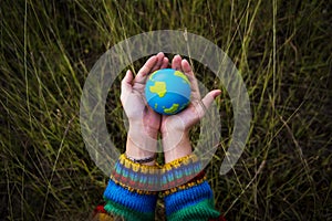 People Hands Cupping Globe Cares Environment