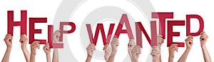 People Hands Holding Red Word Help Wanted