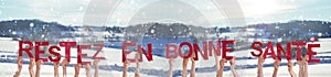 People Hands Holding Restez En Bonne Sante Means Stay Healthy, Snowy Background