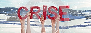 People Hands Holding Word Crise Means Crisis, Snowy Winter Background