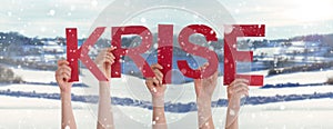 People Hands Holding Word Krise Means Crisis, Snowy Winter Background
