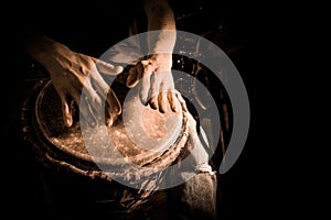 People hands playing music at djembe drums