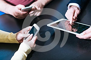 People hands using mobile phones and digital tablet