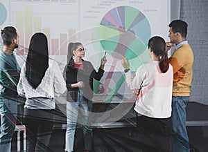 People having business training and dart board. Double exposure