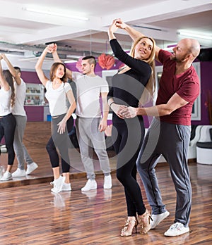 People having dancing class