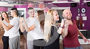 People having dancing class