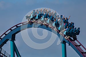 People having fun amazing Mako roller coaster at Seaworl. 5
