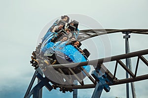 People having fun on a roller coaster