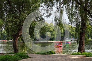 People having a good time on a boats in Beiling Park, Shenyang,