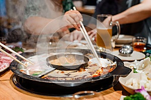 People having a hot pot