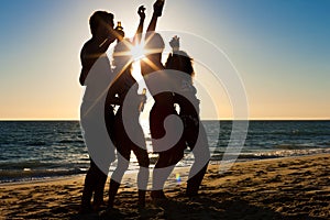 People having party at beach with drinks