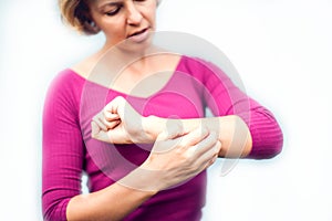 People, healthcare, dermatology, allergy and health problem concept - unhappy woman suffering from hand inch isolated