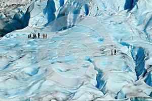 People hiking at the Jostedalsbreen glacier, the biggest glacier in continental Europe, located in Sogn og Fjordane county, Norway