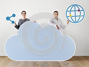 People holding cloud and technology icons