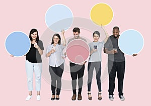 People holding colorful speech bubbles