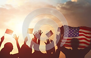 People holding the Flag of USA