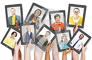 People Holding Tablets with People Profiles photo